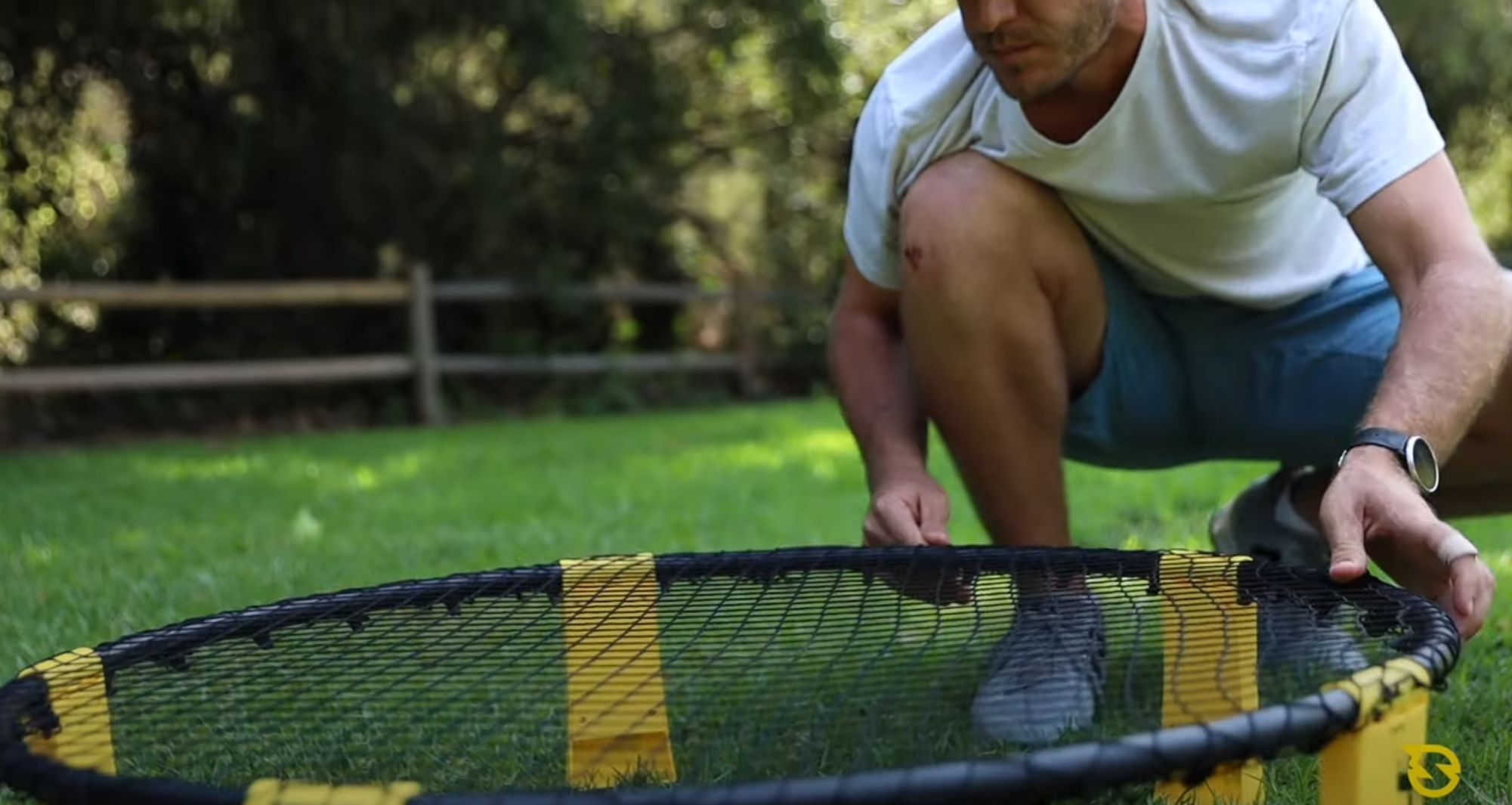 how to set up spikeball